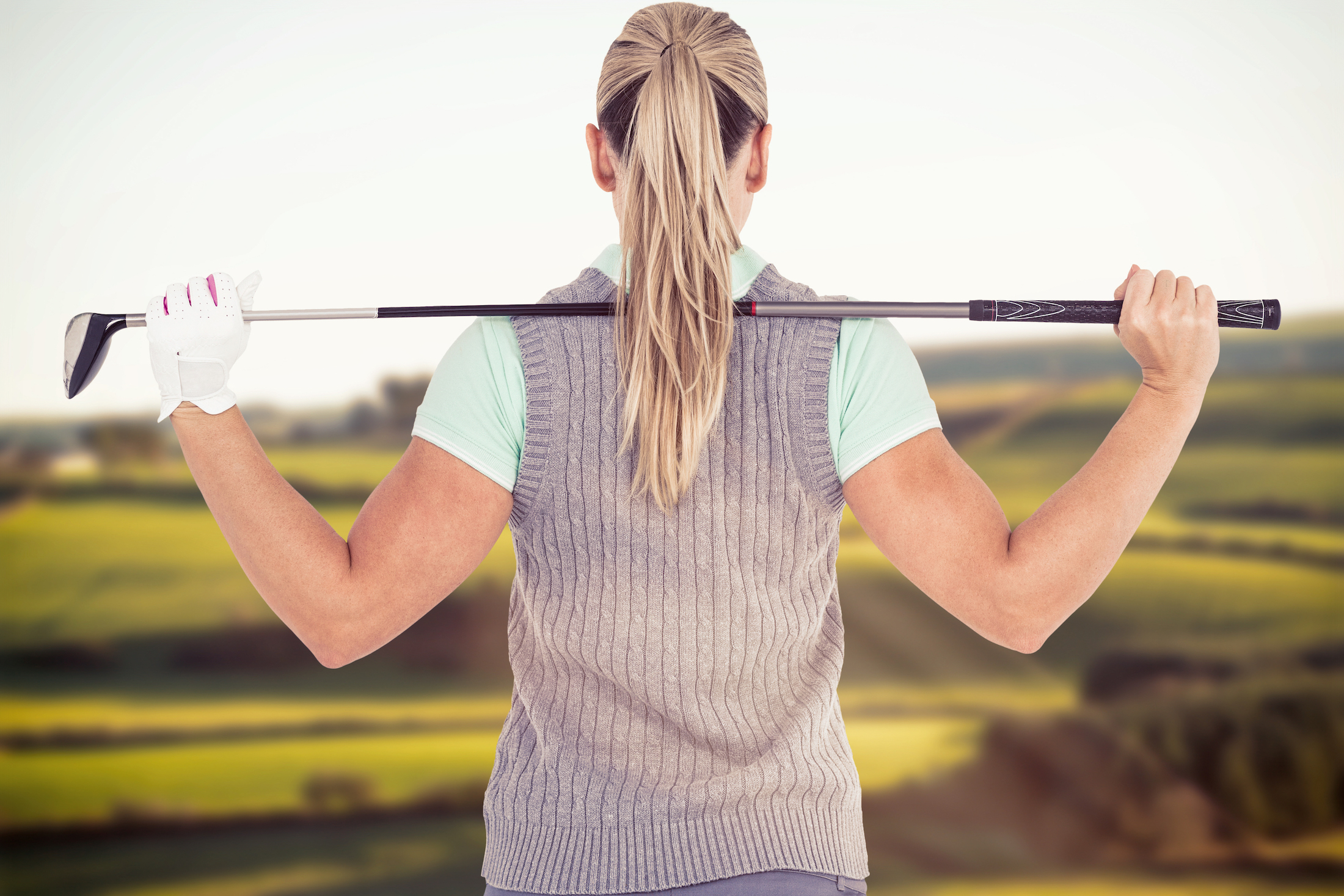 Female Golfer Stretching _ golf management software